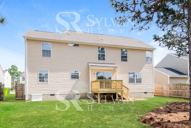 Building Photo - Enjoy living the good life in this 4 bedro...