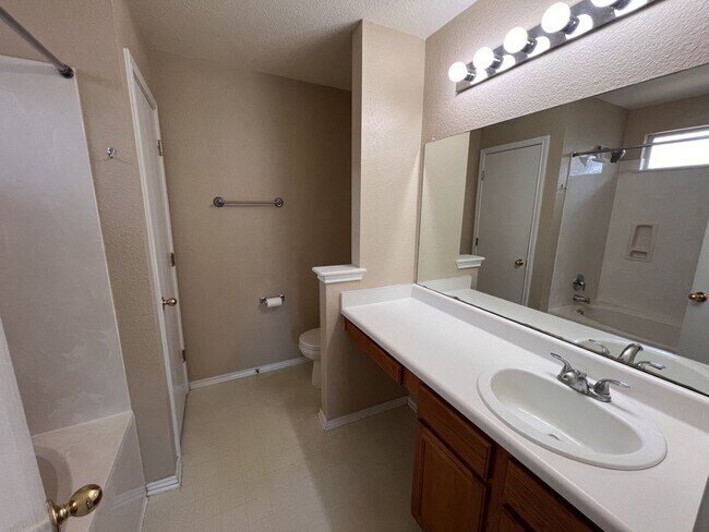 Building Photo - Generous Outdoor Space & Lawn Care Included!