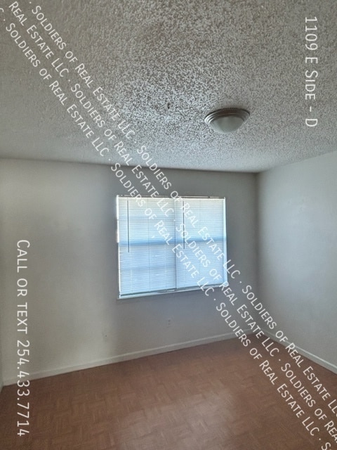 Building Photo - 1109 E Side-D