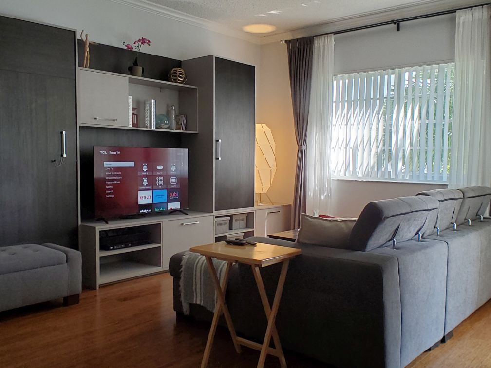 Living room with Murphy bed - 3245 NE 184th St