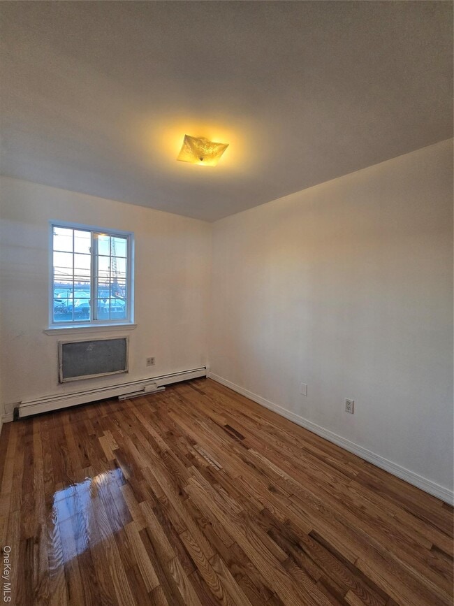 Building Photo - 22-11 119th St