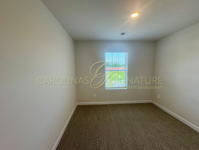 Building Photo - Beautiful New Construction Townhome in Uni...