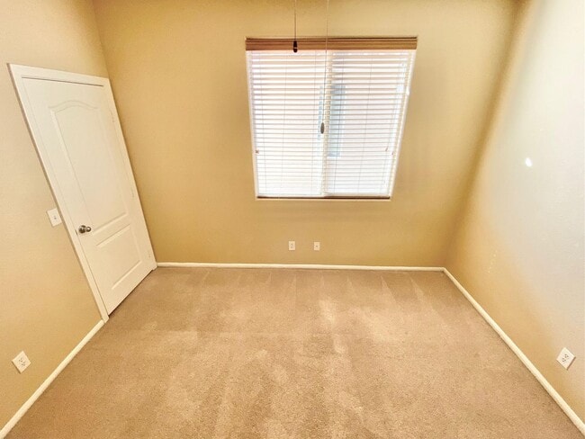 Building Photo - THIS SPACIOUS RESIDENCE FEATURES 4 BEDROOM...