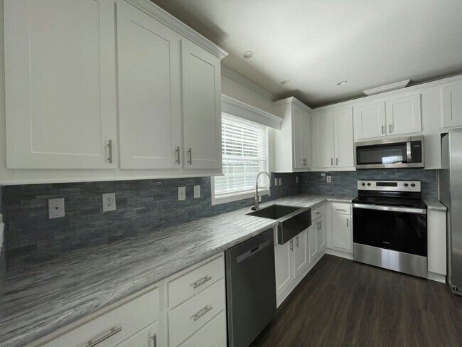 Building Photo - 5018 Windmill Manor Ave