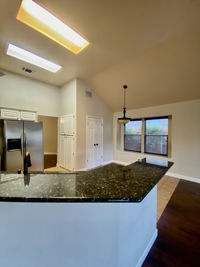 Kitchen & laundry room - 12906 Legend Field Dr