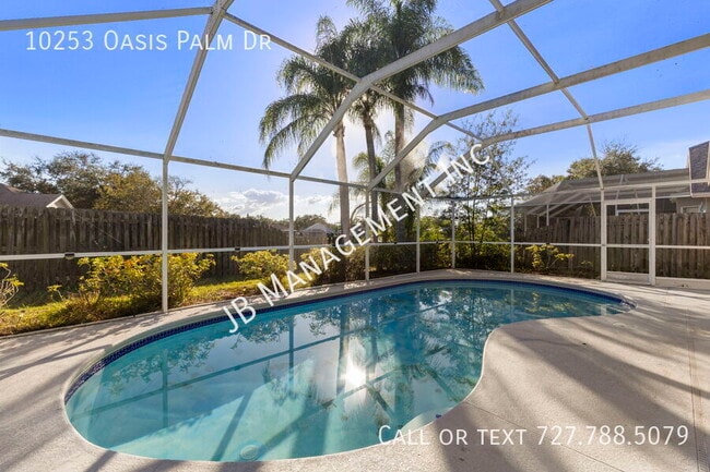 Building Photo - 10253 Oasis Palm Dr