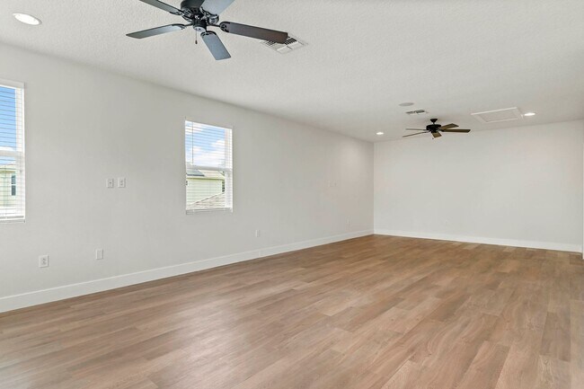 Building Photo - Expansive 4 bedroom, 3 bath remodeled home in gated community