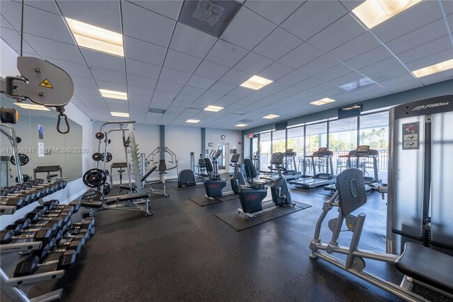 Building Photo - 3675 N Country Club Dr