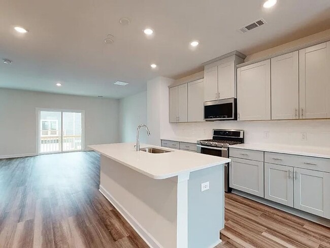 Building Photo - spacious and beautifully appointed townhome