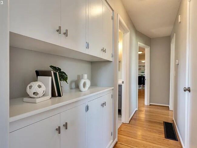 Building Photo - Stylishly Updated Mid-Century Gem on a Qui...