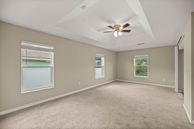 Building Photo - Newer 3BR Home on Nearly 1/4 Acre | Screened Lanai | Available Now!