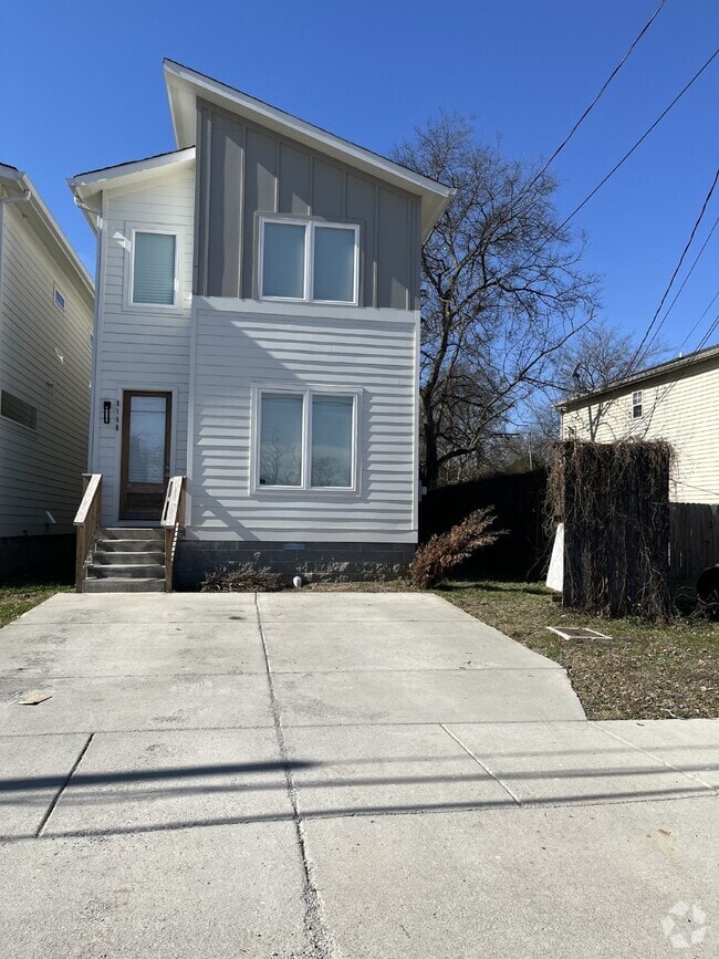 Building Photo - "Charming 4-Bedroom Nashville Oasis with E...