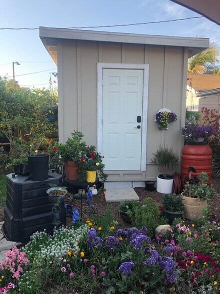 Compost bin for yard and certain kitchen scraps. - 2208 Gramercy Ave