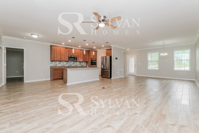 Building Photo - Feel welcome and comfortable in this charming home