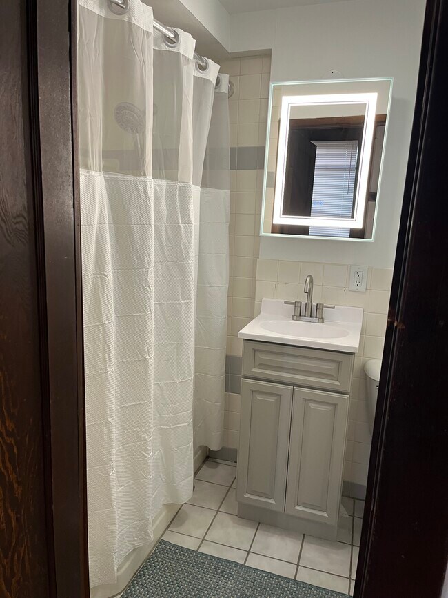 NEW VANITY EN SUITE BATHROOM FIRST FLOOR BEDROOM - 32 E Northwood Ave