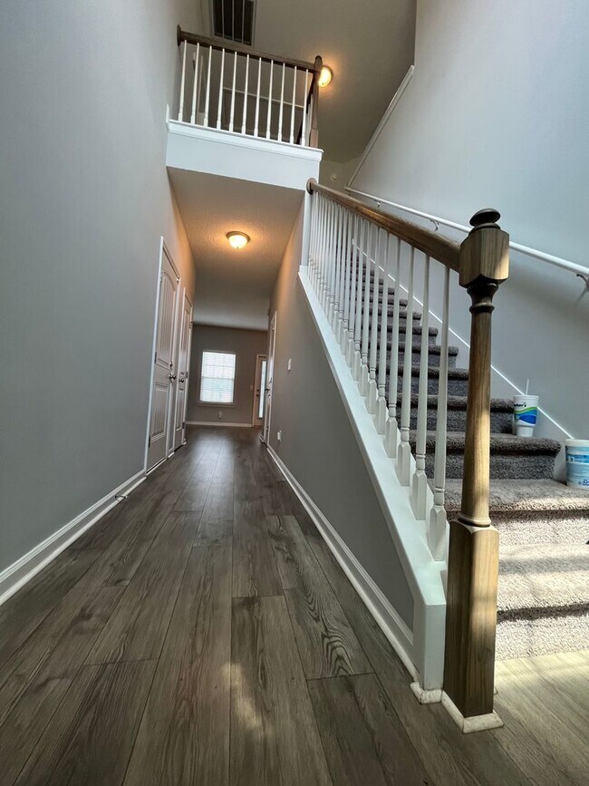 Building Photo - Spacious 4-Bedroom Pet Friendly Home with a Serene View - Available for Rent!