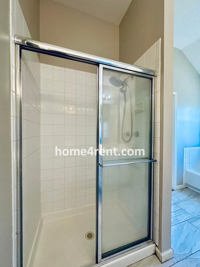 Building Photo - Brand New Paint, Wood Floors, Walkout Fini...