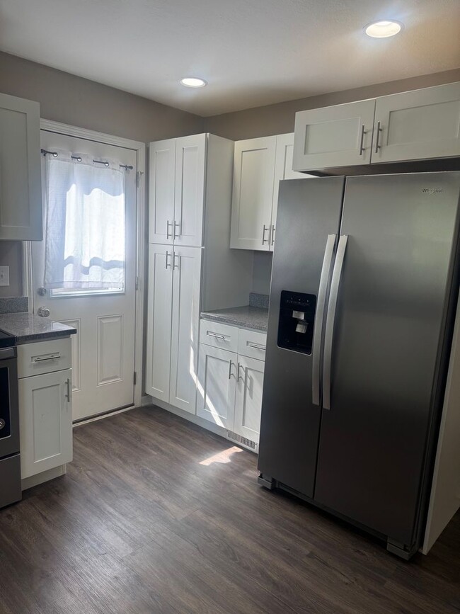 Building Photo - Charming Updated 3BR Home with Large Fenced Yard & Garage