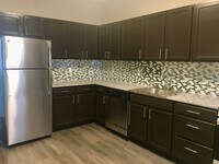 Building Photo - *** Duplex Style Apartment * Pet Friendly * Renovated * Available Now * Granite Counters * Stainl...
