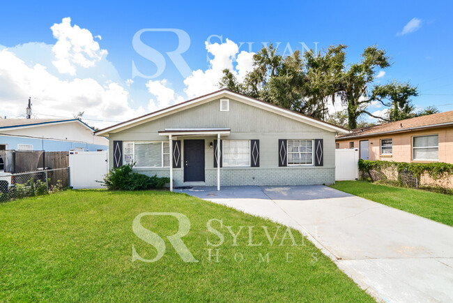 Primary Photo - The living is easy in this 3 bedroom, 1 ba...