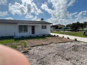 Building Photo - "Charming 2-Bed Retreat Waterfront W/Pool ...