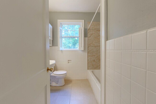 Building Photo - Updated home blends historic charm with mo...