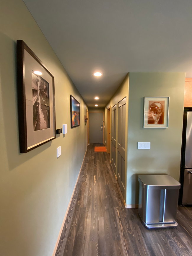 Hallway with closets and European laundry units - 3435 California Ave SW