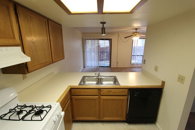 Building Photo - Bright 2BR Townhome in Boyington Heights | Private Balcony + Fenced Backyard