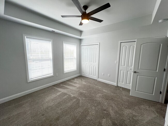 Building Photo - Available Now! - Pet Friendly 2 Bedroom, 2.5 Bath Townhome at Market Common! Cable and Internet I...