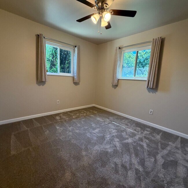 Building Photo - Adorable house with large deck,  yard and RV access