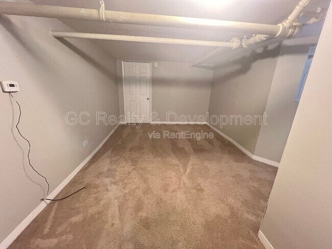 Building Photo - 5410 W Berteau Ave