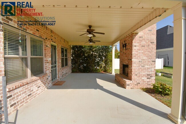 Building Photo - All brick 4 bedroom home plus Bonus room! Garage and covered patio!