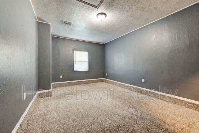 Building Photo - 8616 N Harvey Ave