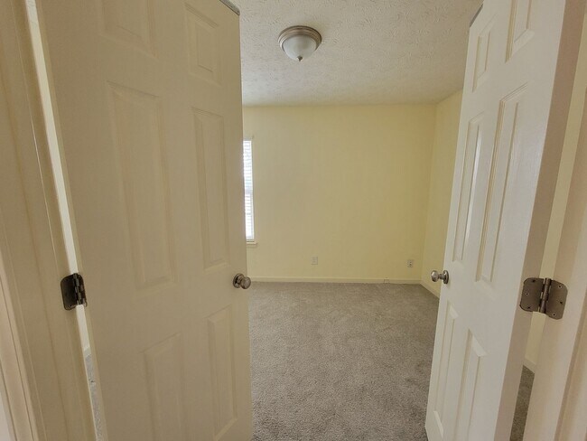 Building Photo - Lake Front Property. Loft - Swim/Tennis - Stainless Steel Appliances