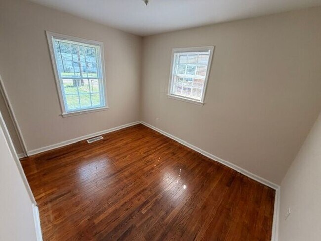Building Photo - Three bedroom brick home available now!
