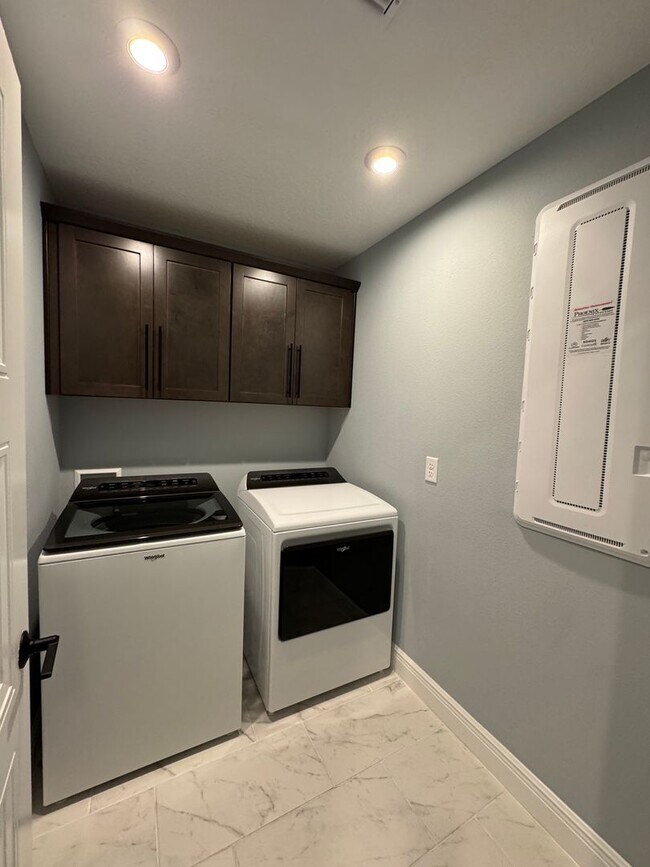 Building Photo - Elegant living in a vibrant, strategically located community—your perfect place to call home.