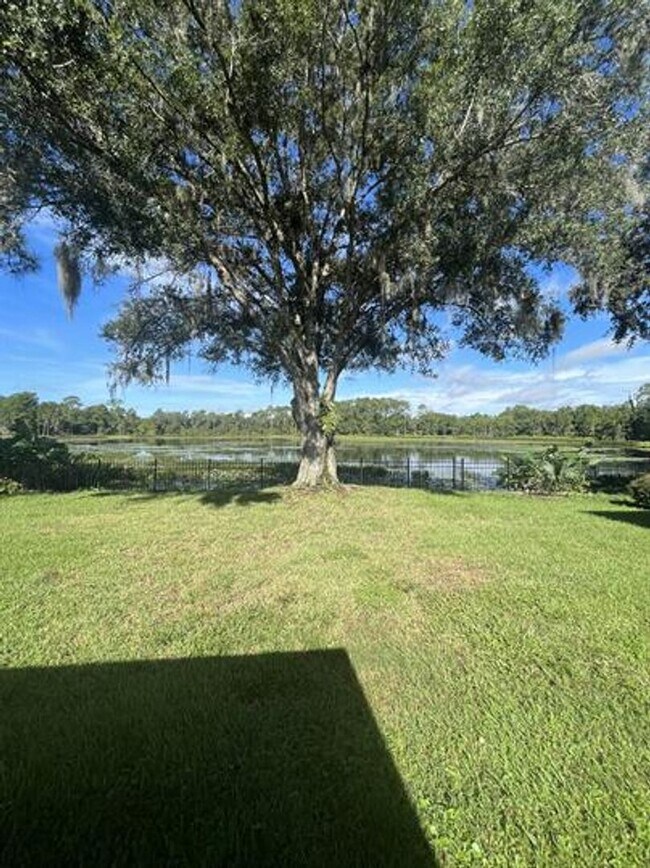 Building Photo - Eustis Lake Front Home with 2 Primary Bedr...