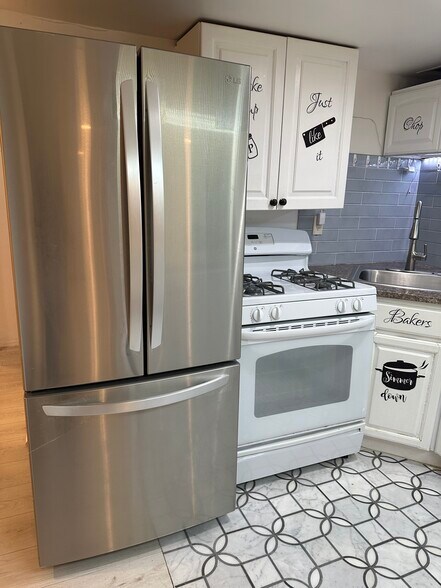 Full size fridge and full size stove - 104 N 7th St