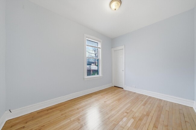 Building Photo - 3311 N Kostner Ave