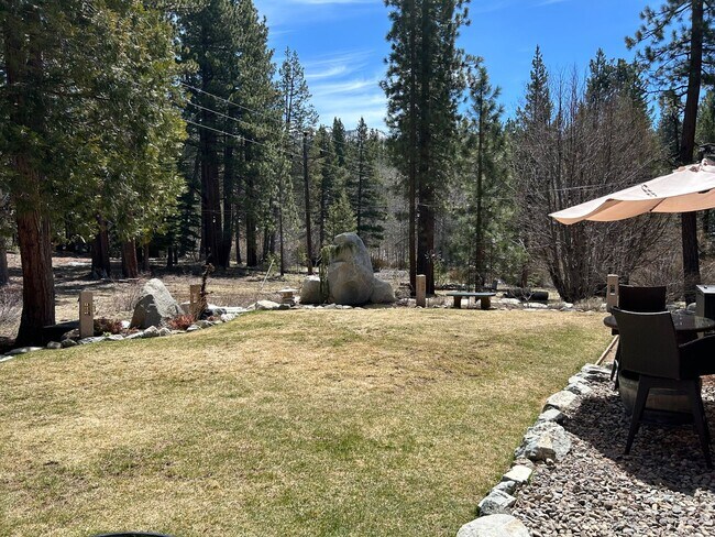 Building Photo - Upscale Chalet with 2 Car Garage Backing t...