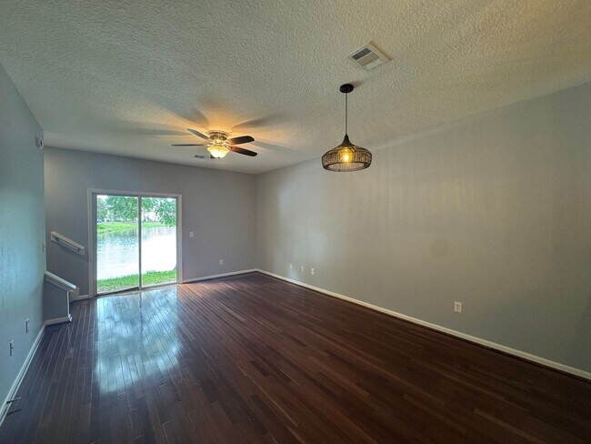 Building Photo - Available Now! Westside Timothy's Landing 2/2.5 Townhome with a 1-Car Garage
