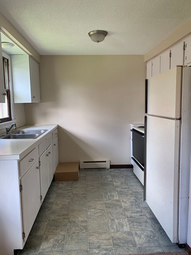 Building Photo - Coe St Apartments.