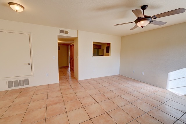 Unit 813--Single floor unit hallway leading to kitchen, baths and bedrooms - 2210 Miguel Chavez Rd