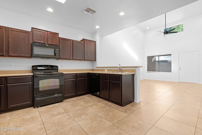 Building Photo - 8940 W Olive Ave