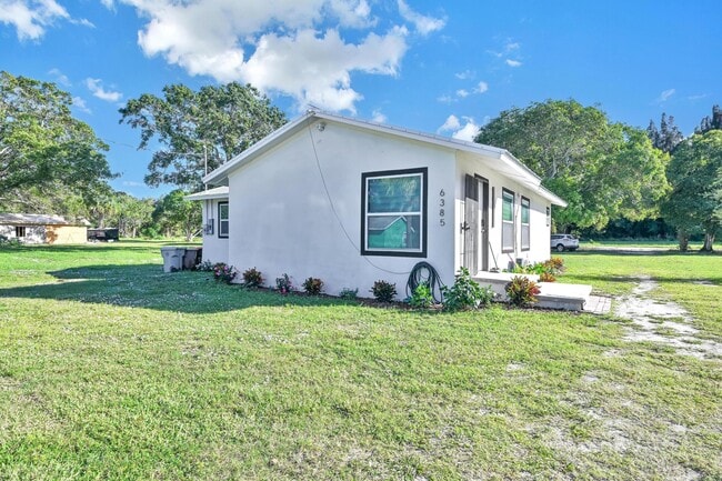 Building Photo - 6385 86th Ln