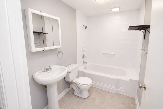 Building Photo - Updated Multi-Bedroom Home | Brand-New Deck | Circular Drive | Triad Premier Realty