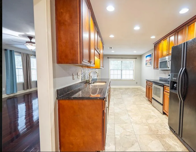 From the kitchen looking East. The Living Room is just to the left. - 12366 Copperwood Dr