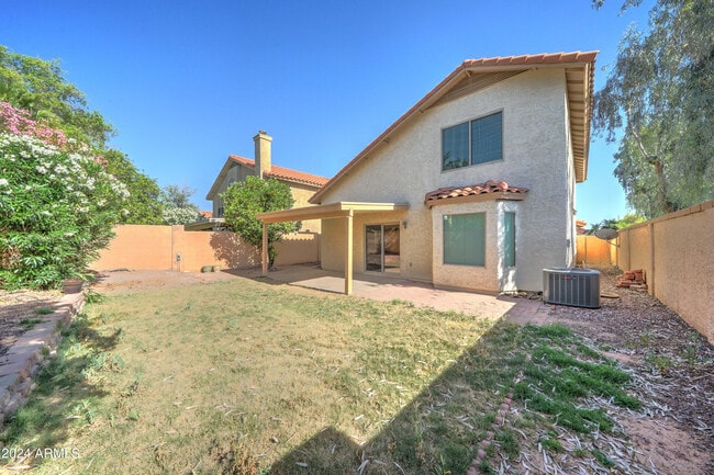 Building Photo - 8804 E Charter Oak Dr