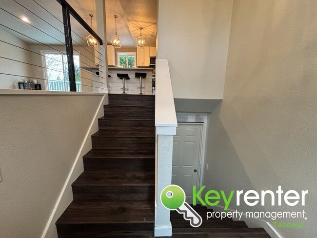 Building Photo - Shared Split level 3 Bed 2 Bath Upstairs Unit with Modern Upgrades Close to JBLM!