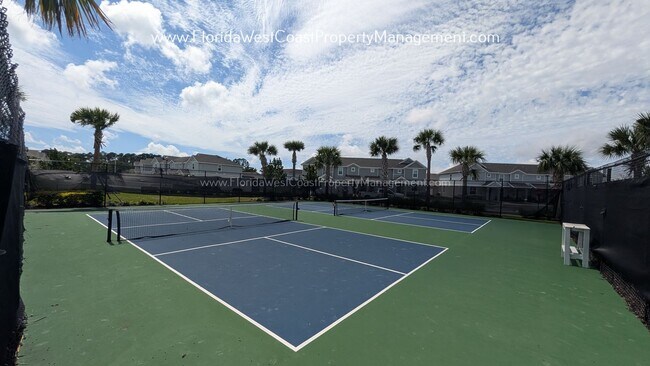 Building Photo - EXCEPTIONAL AND SPACIOUS FURNISHED TOWNHOME WITHIN WATERSIDE- NAUTIQUE!